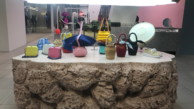 Why are these handbags lit like an exhibit at the Natural Museum of History?